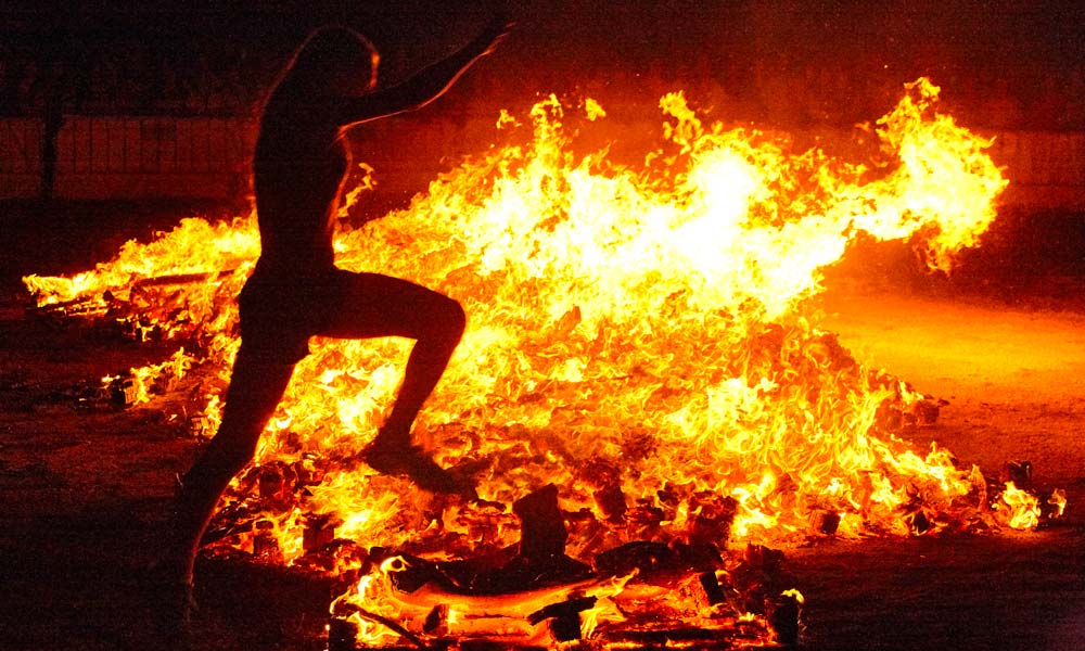 San Juan, jumping over embers
